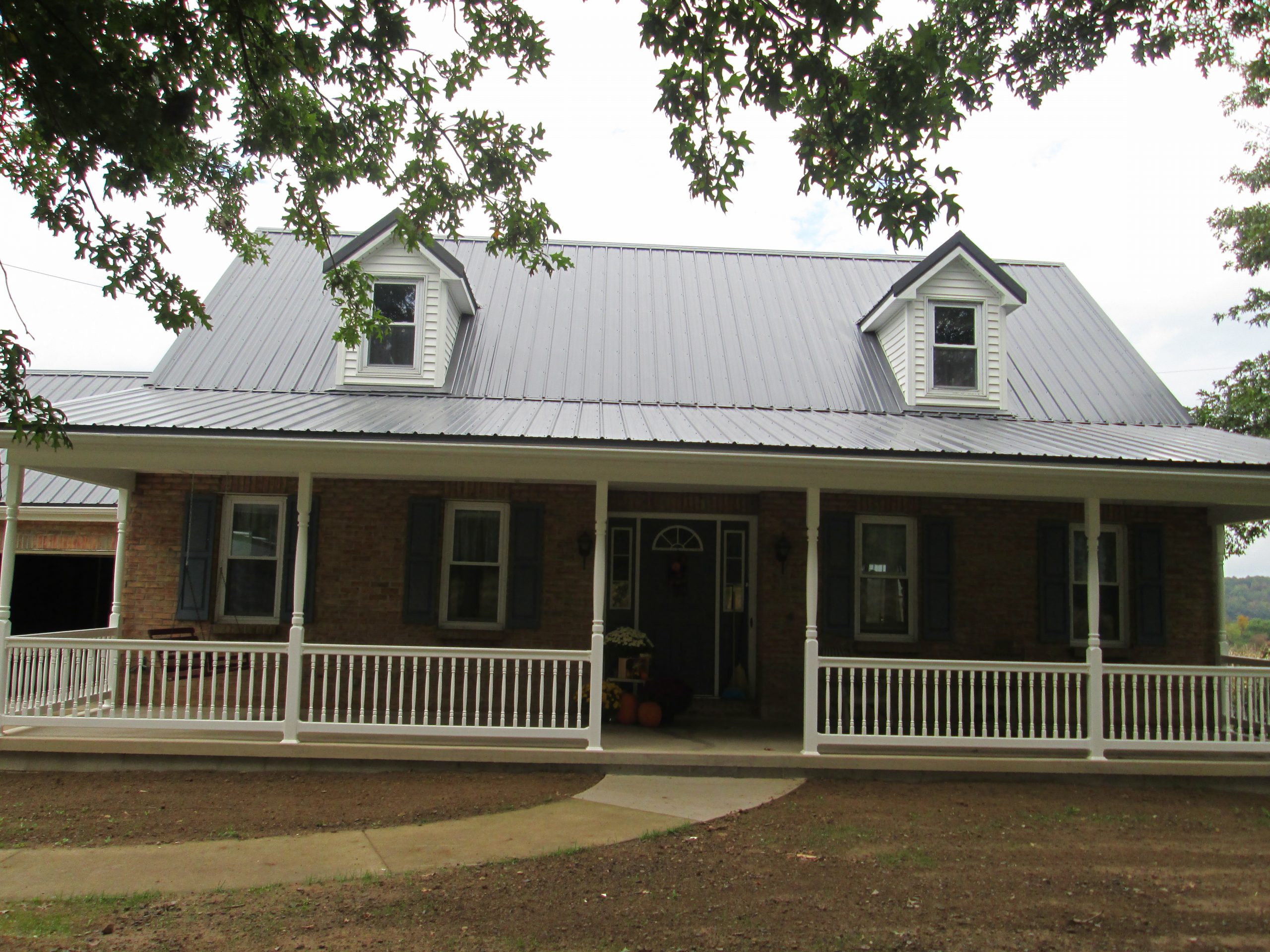 Replace Shingles with Metal Roofing